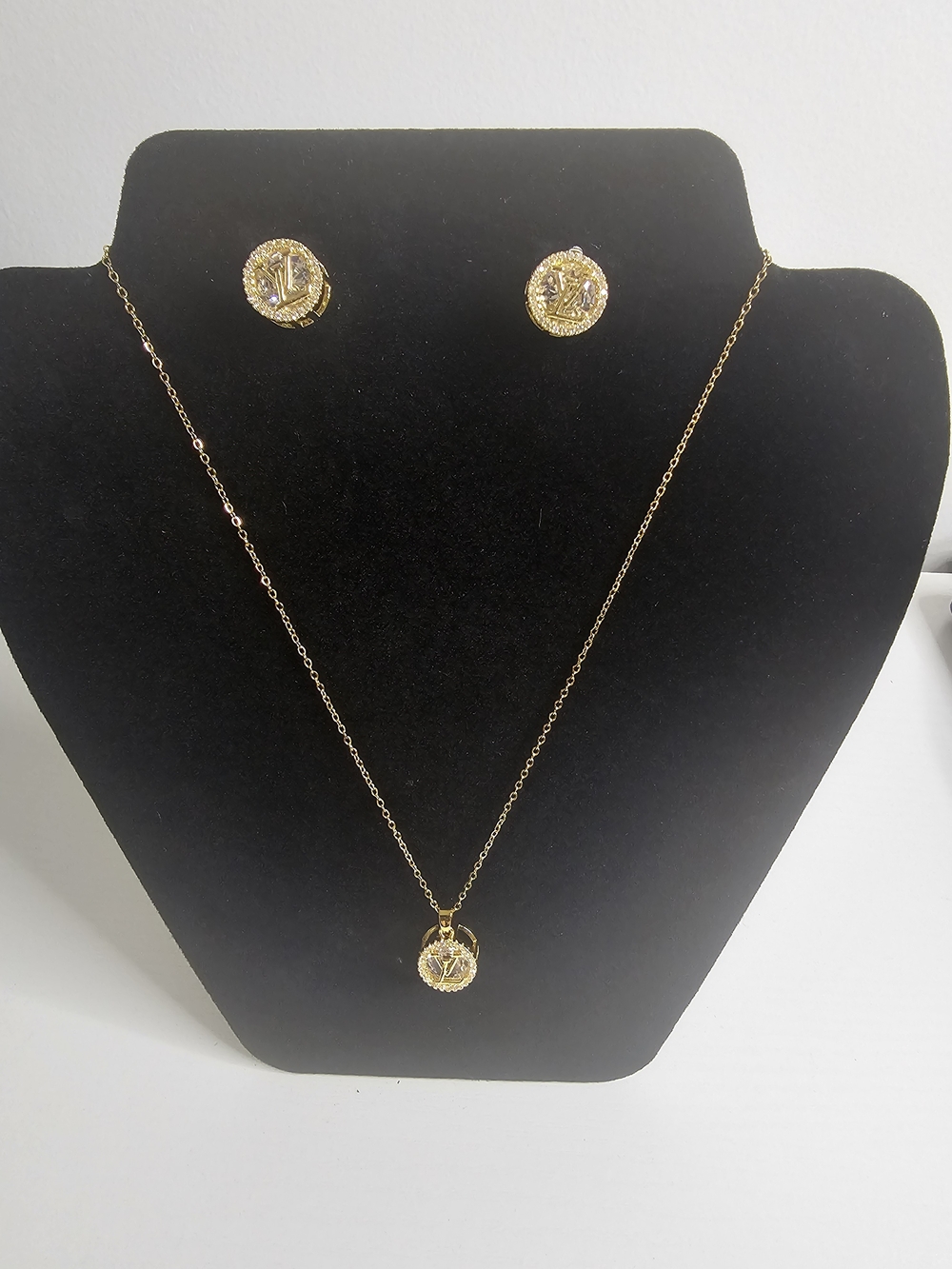 Gold Stainless SteelDisc Pendant Necklace with Matching Stud Earrings